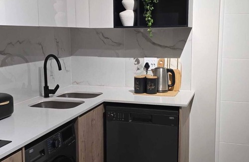 Greater Johannesburg Metropolitan Area Apartment | Chic 1-bedroom apartment in welcoming Midrand with fitness room, WiFi