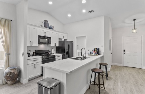 North Las Vegas House | Chic 1Story Pool Home 2KingBeds, Grill, Coffee, AirHockey, Mins2 Las Vegas Strip