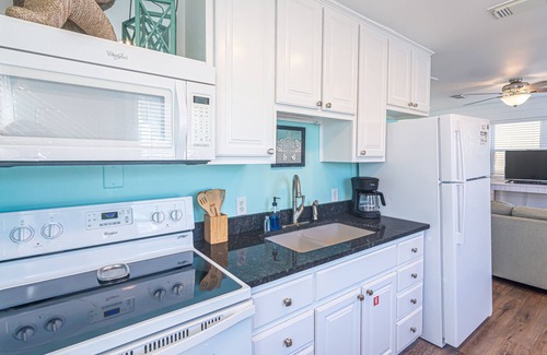 Gulf Shores Cottage | Chic 2BR Getaway with Pool & Balcony Just Steps from the Sand