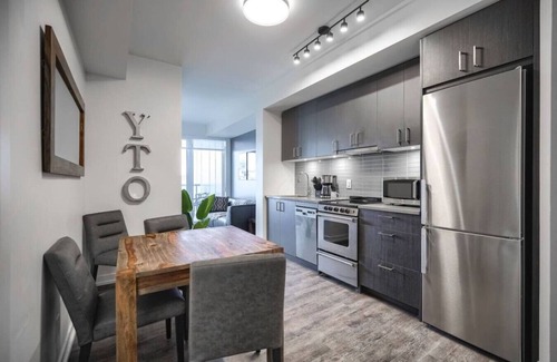 Church and Wellesley Apartment | Chic 2BR Oasis with Skyline Views near Berczy Park
