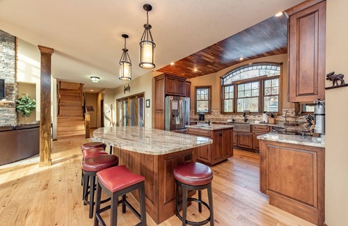 Waterfront Greens House | Chic Lake Access Home w/Hot Tub & Fireplaces