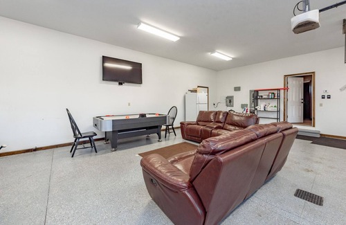 Waterfront Greens House | Chic Lake Access Home w/Hot Tub & Fireplaces