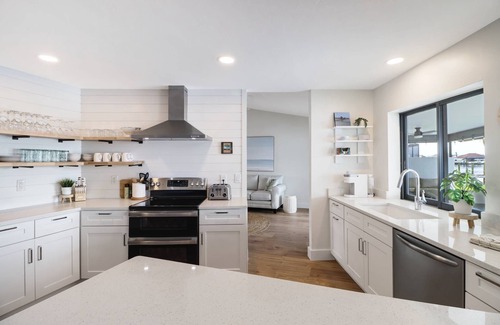 Eight Lakes House | Chic Remodel! Gulf-Access Waterfront! Heated Pool, Kayak, Bikes & Over $125 of Free Daily Activities