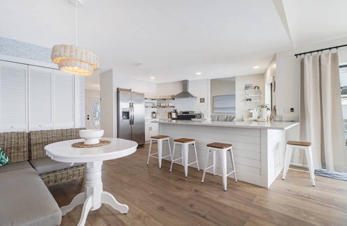 Eight Lakes House | Chic Remodel! Gulf-Access Waterfront! Heated Pool, Kayak, Bikes & Over $125 of Free Daily Activities