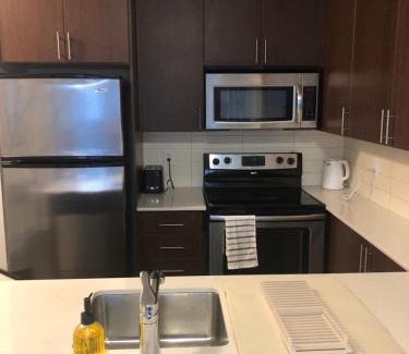 Wellington Place Apartment | Chic Toronto Blue Jays Getaway