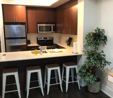 Wellington Place Apartment | Chic Toronto Blue Jays Getaway