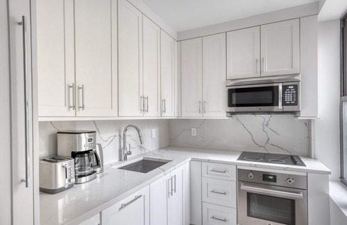 Bloomingdale Apartment | Chic UWS 1BR w/Gym, Elevator & W/D, nr Central Park, by Blueground
