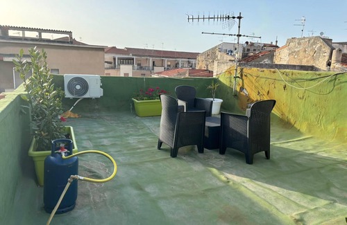 Sassari Apartment | Civic 10 II Spacious studio apartment with terrace above at Sassari Center