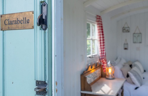 Brandeston Apartment | Clarabelle is a beautiful shepherd's hut set in a blooming kitchen garden
