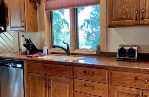 Cody House | Clarks Fork Crossing, located off the Chief Joseph Scenic Byway with river access!