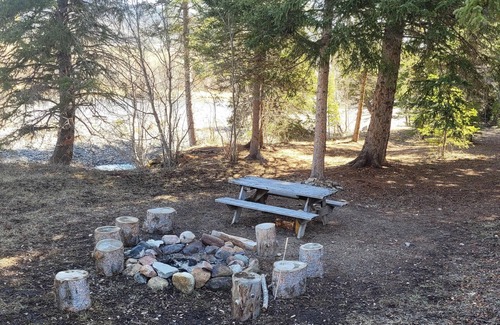 Cody House | Clarks Fork Crossing, located off the Chief Joseph Scenic Byway with river access!