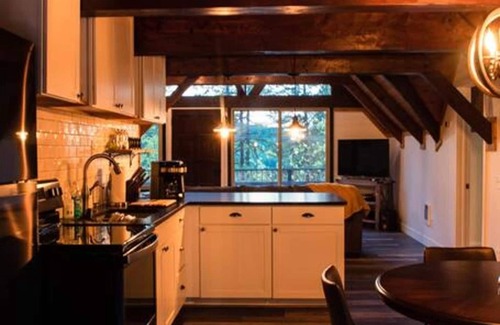 Whitefish House | Classic A-frame - Sleek Modern Interior