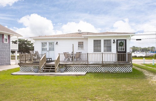 North Carolina Coast Cottage | Classic Beach Cottage with front porch view of water