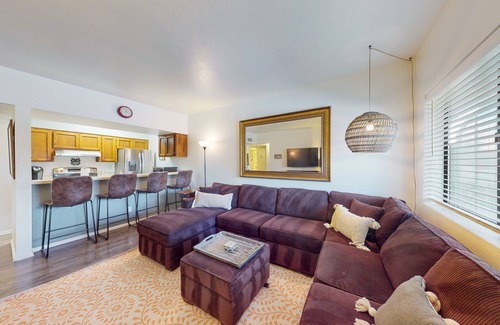 Dietz Condo | Classic condo with a balcony, washer/dryer, central AC, pool
