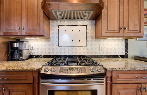 Central Oklahoma City House | Classic Luxury Tutor and Garden Studio with Private Backyard