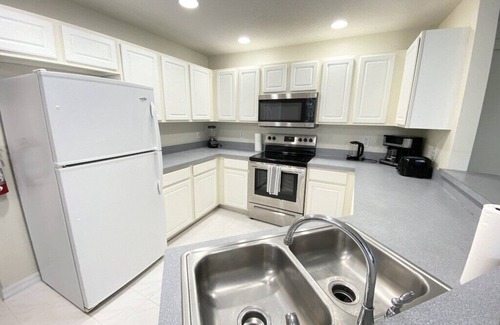 Kissimmee Villa | Clean and serene 4 bedroom 2.5 bath with Pool near Orlando attractions