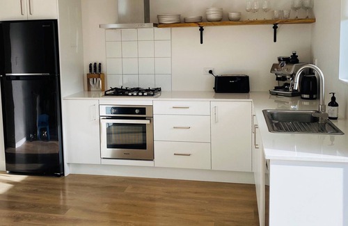 Hobsonville House | Clean and Tidy 2 Bedroom Townhouse With Playroom. Perfect for Families