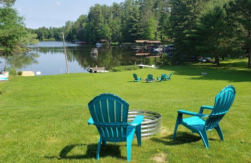 Eagle River Cottage | Clean cottage on the Eagle River Chain, dock, firewood, edge of town