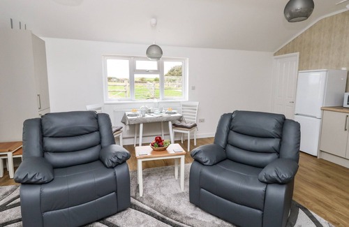 Bridport Cottage | CLIFF BARN, pet friendly, with open fire in Burton Bradstock