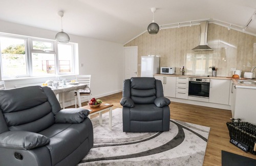 Bridport Cottage | CLIFF BARN, pet friendly, with open fire in Burton Bradstock