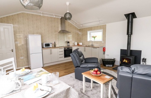 Bridport Cottage | CLIFF BARN, pet friendly, with open fire in Burton Bradstock