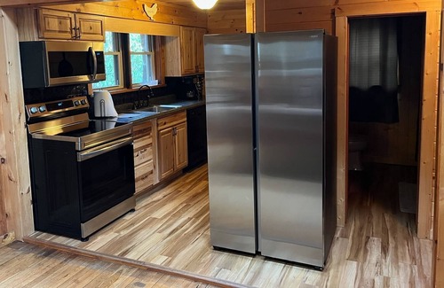 Rawley Springs Cabin | Cliff side living by the river at Pine Bluff