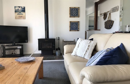 Potato Point House | Clifftop Beach House - Walk to two pristine beaches - whale watching from deck