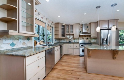 Englewood House | Close to 3 Beaches, Private Gated Waterfront Tropical Oasis Heated Pool Estate