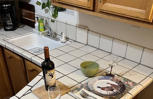 West Sacramento Cottage | Close to downtown, with beautiful gardens, sparkling pool & private entry