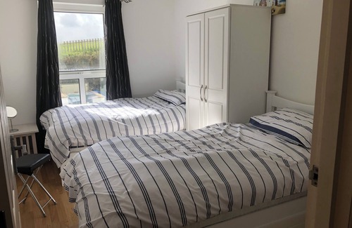Portstewart Apartment | Close to Portrush golf with superb views of the north Irish Coast.Cool apartment