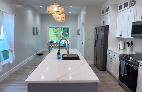 Foley House | Close to Sports Complex, OWA, beaches, shopping, restaurants. King bed.
