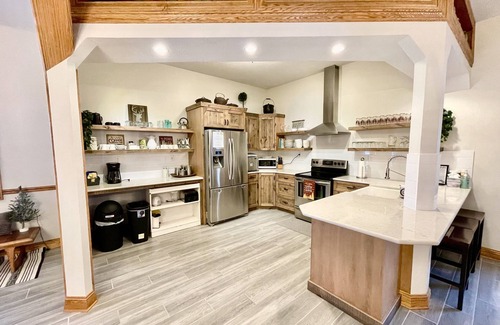 Central Lake House | Close to Torch Lake. Event and Sports Barn. Great golf nearby. Sleeps 13+. Bunks