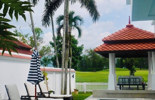 Laguna Villa | Coastal bliss: bright, breezy family villa on a golf course near beach & town.