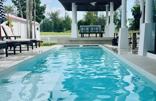 Laguna Villa | Coastal bliss: bright, breezy family villa on a golf course near beach & town.