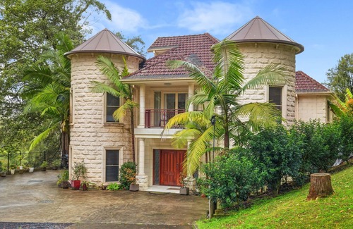 Central Coast House | Coastal Castle with Piano, Movie Room and Library