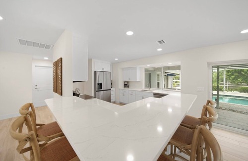 Shell Harbor House | Coastal Charm: Pool Home on Canal on East End!