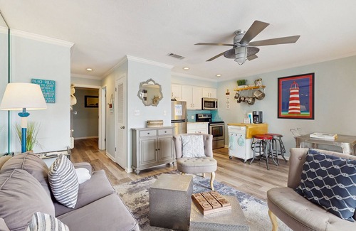 Gulf Shores Condo | Coastal condo 100 yards from the beach w/balcony - walk everywhere!