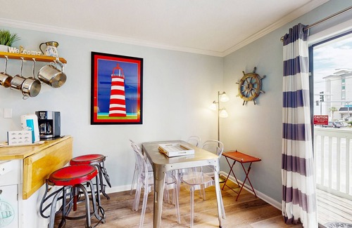 Gulf Shores Condo | Coastal condo 100 yards from the beach w/balcony - walk everywhere!