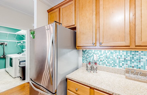 Supply Condo | Coastal condo with excellent views, balcony, washer/dryer, & AC - pool access