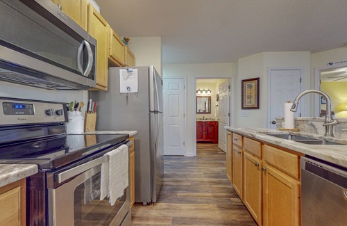 St. James Condo | Coastal Condo with golf course view and shared pool access
