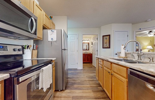 St. James Condo | Coastal Condo with golf course view and shared pool access