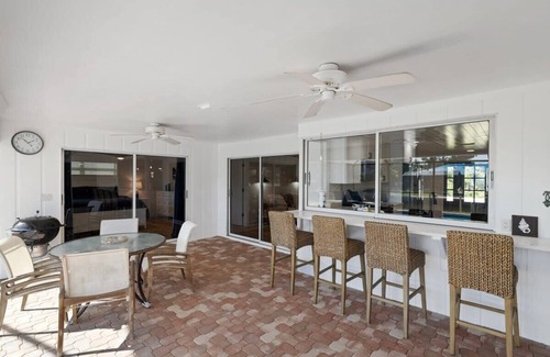 Shell Harbor House | Coastal Cottage on Canal, East End with Pool