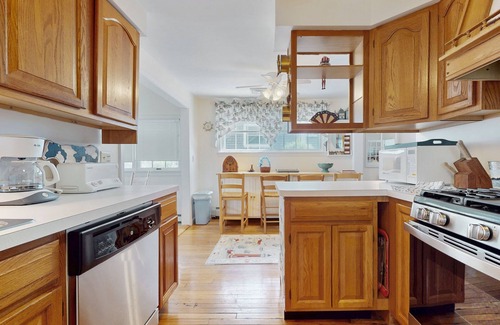 Pocasset House | Coastal dog-friendly cottage near Hen Cove with sunroom, beach access, & games