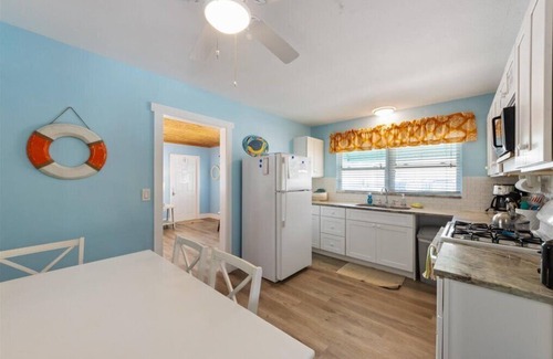 Bradenton Beach Apartment | Coastal Getaway Retreat –Steps to the Beach! 2BR/1BA. Sleeps 4. In 4-Plex. Pool