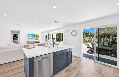 Naples Park House | Coastal Getaway w/Pool, Spa & Tiki Lounge