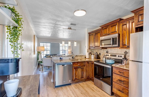 Pompano Beach House | Coastal oasis retreat with fire pit near Pompano Beach Pier.
