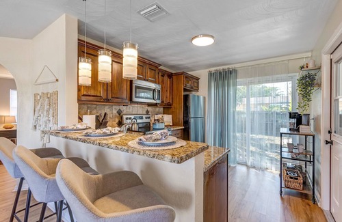 Pompano Beach House | Coastal oasis retreat with fire pit near Pompano Beach Pier.