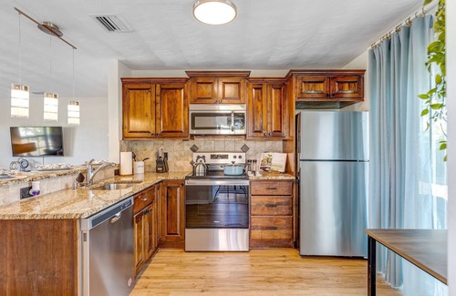 Pompano Beach House | Coastal oasis retreat with fire pit near Pompano Beach Pier.