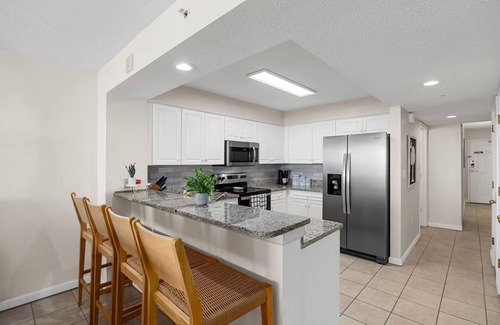 Ocean Drive Condo | Coastal Palm - Panoramic Views - Indoor & Outdoor Pool, Lazy River & Hot Tub