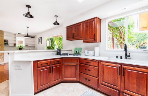 Padaro Lane House | Coastal ranch-style home in garden setting.